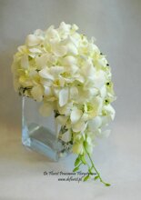 wiązanka ślubna śnieżno biała z frezji rózy eustomy
